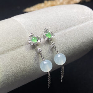 Front view of 18K high ice jade trau earrings showing radiant translucent jade beads