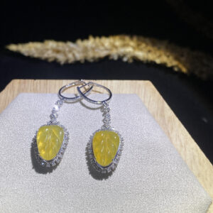 Front view of 18K lemon yellow leaf yellow jade earrings showcasing vibrant leaf-shaped jade stones