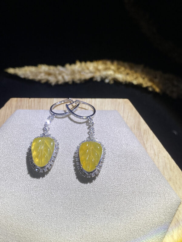 Front view of 18K lemon yellow leaf yellow jade earrings showcasing vibrant leaf-shaped jade stones
