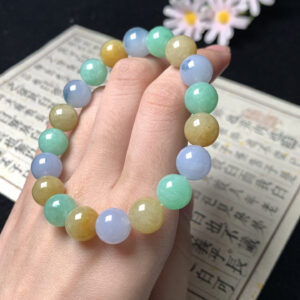 Beaded jade bracelet with 10mm yellow, purple, and green jade beads