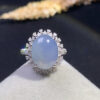 18K blue jade cabochon ring with smooth oval stone set in gold