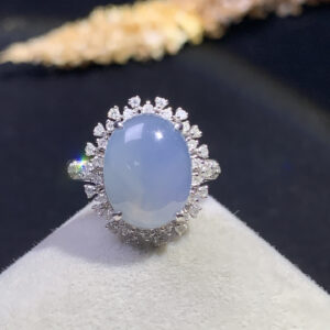 18K blue jade cabochon ring with smooth oval stone set in gold