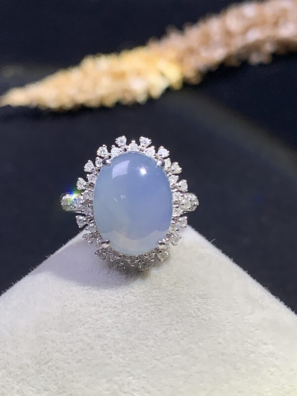 18K blue jade cabochon ring with smooth oval stone set in gold