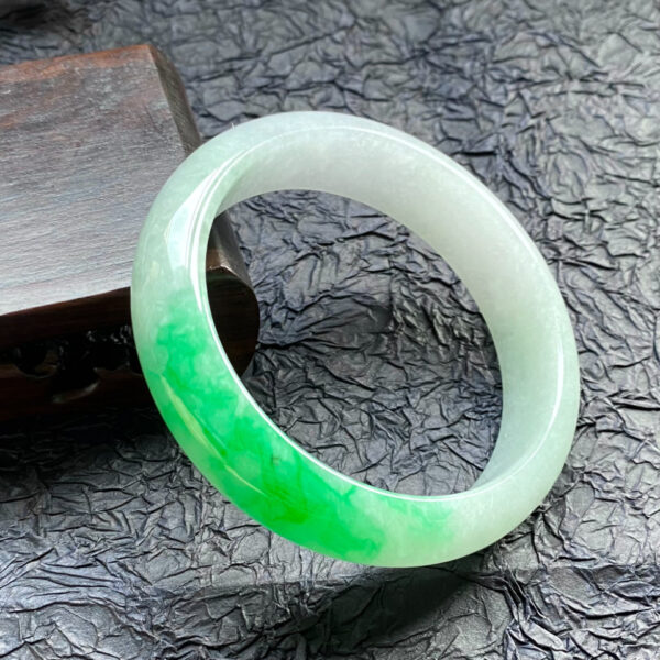 Left side angle of bracelets jade bangle in icy white jadeite