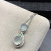 Close-up detail of natural jade texture on 18K gold jade necklaces