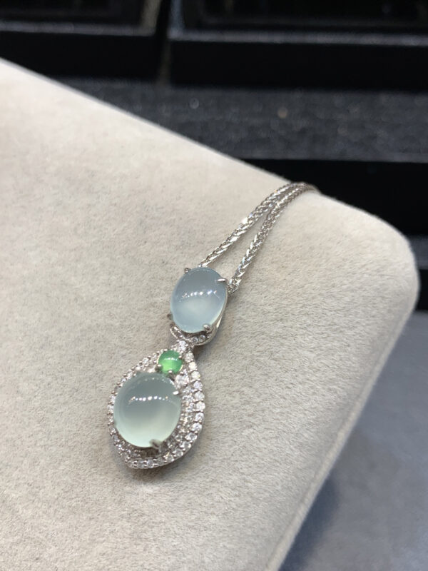 Close-up detail of natural jade texture on 18K gold jade necklaces