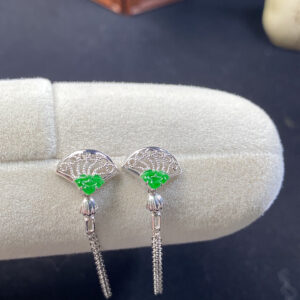 Front view of 18K green jade and gold fan earrings showcasing elegant carved jade and polished gold design
