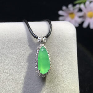 Front view of gourd-shaped pendant in green jade colour with 18K gold setting