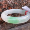 Side view showing the 13mm thickness of jade bracelet