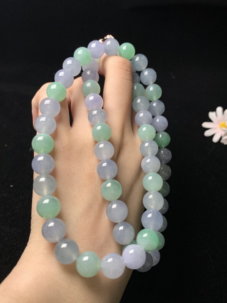 Cleaning jade bead necklace with soft cloth