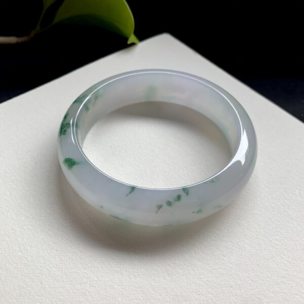 Side view of jade bracelet bangle 58.5mm wide ice green flower design