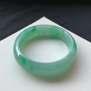 Front view of full-green jade bracelets with icy texture
