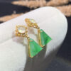 Front view of 18K gold jade drop earrings featuring ice green jadeite stones