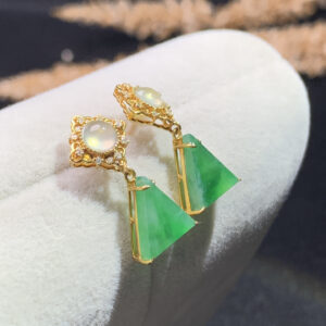 Front view of 18K gold jade drop earrings featuring ice green jadeite stones