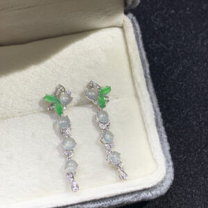 Front view of 18K gold jade earrings for women with smooth oval cabochon design