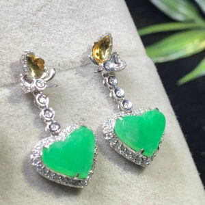 Front view of 18K gold jade earrings studs with apple green heart-shaped jade
