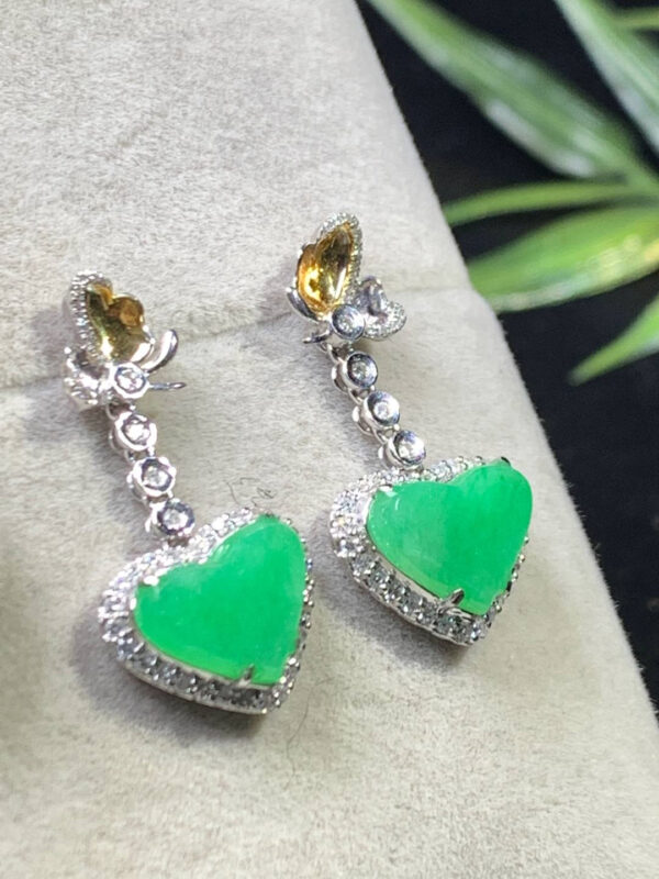 Front view of 18K gold jade earrings studs with apple green heart-shaped jade