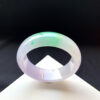 Wide-band jade stone bracelet crafted from high-quality jade, representing strength and protection.