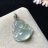Side profile of jadeite pendant Buddha carved in icy jade with 18K gold setting