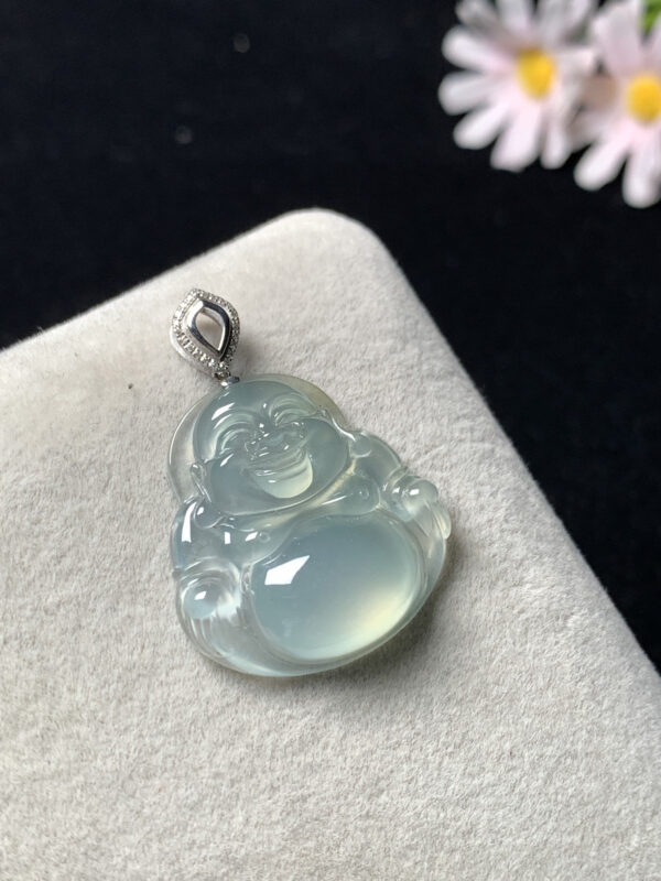 Side profile of jadeite pendant Buddha carved in icy jade with 18K gold setting