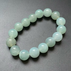 Front view of 12.8mm mens jade bracelet made from icy green jadeite