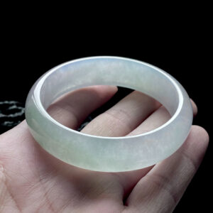 Front view of 57.4mm icy Qing Shui white jade bracelets