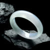 Back view of polished white jade bracelets