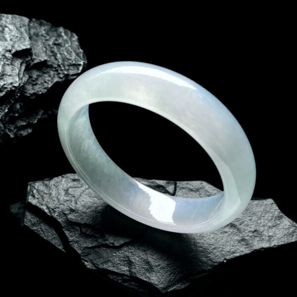 Back view of polished white jade bracelets