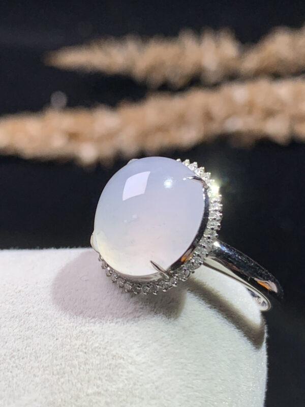 Side profile of 18K white ice jadeite ring highlighting band and stone height