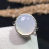 Front view of 18K white ice jadeite ring with oval cabochon gemstone