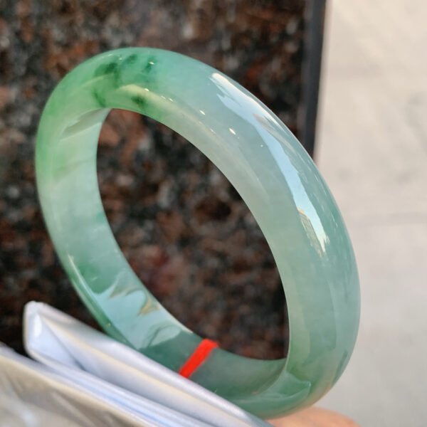Blue jade bracelet under natural light