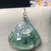 Icy jadeite stone with natural floating patterns (piao hua) in Happy Buddha pendant