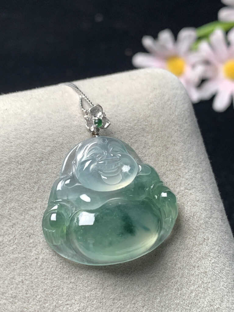 Front view of ice green jade Buddha necklace showcasing detailed carving