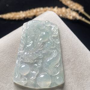 Icy jade dragon necklace close-up showing intricate dragon carving
