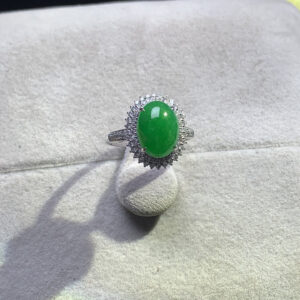 Jade rings featuring imperial green cabochon in 18K gold