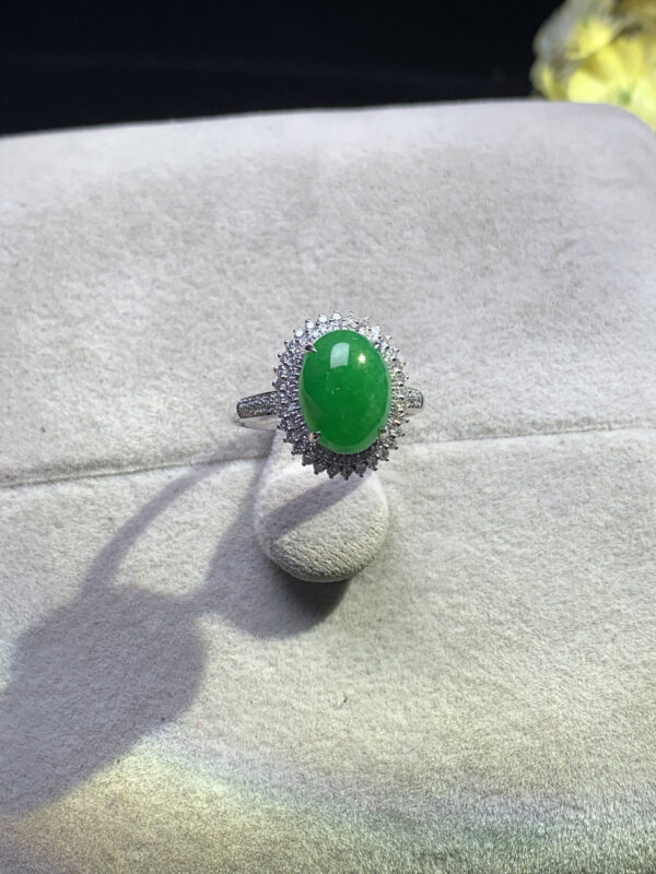 Jade rings featuring imperial green cabochon in 18K gold