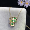 Close-up of butterfly pendant with teardrop high-ice green jadeite stones