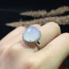 18K white ice jadeite ring worn on finger, showcasing fit and style