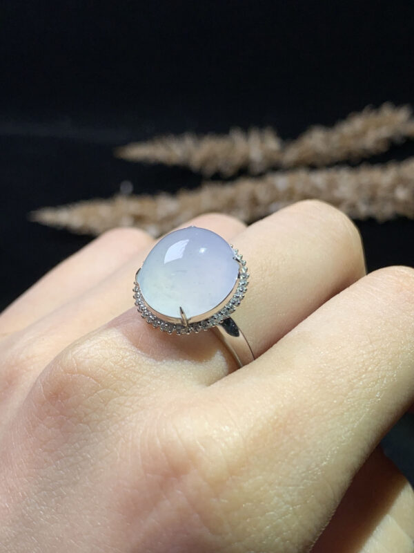 18K white ice jadeite ring worn on finger, showcasing fit and style