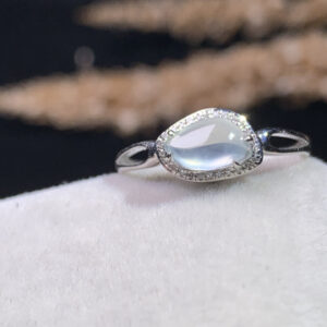 Jadeite stone ring with white icy cabochon in 18K gold, front view