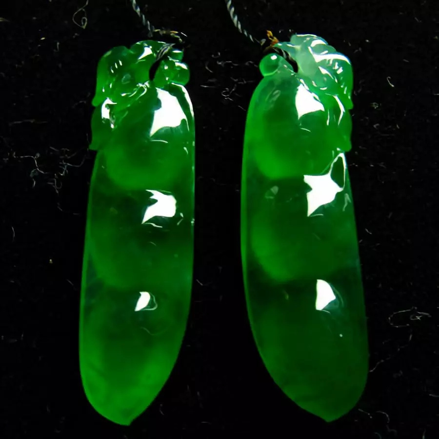 Magnified view of natural inclusions inside a jadeite gemstone
