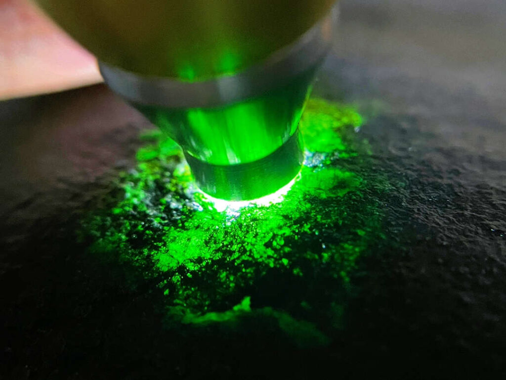 Close-up of a vivid imperial green jade stone showing its quality and texture, essential for determining how much is a jade stone worth