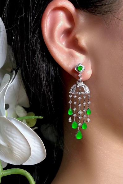 Elegant real jade earrings in natural green color